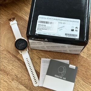 Garmin White and Gold Smartwatch Sleek Design Fitness Tracking